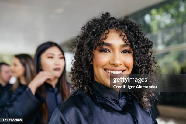 smiling college student ready to graduate - extreme close up woman stock pictures, royalty-free photos & images