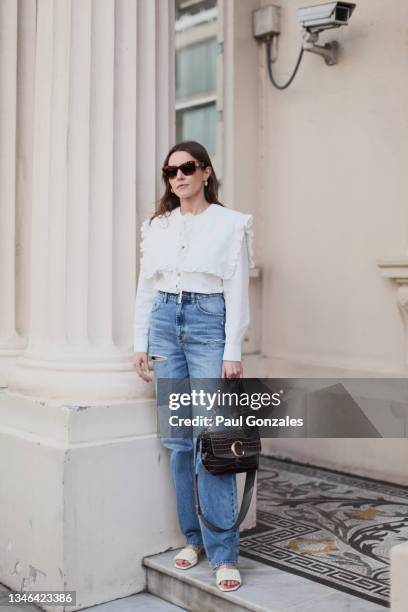 Chloe Street is seen wearing a White Blouse at Bora Aksu, during London Fashion Week September 2021 on September 17, 2021 in London, England.