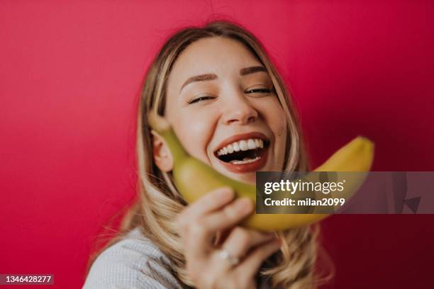 body conscious woman - banana woman stock pictures, royalty-free photos & images