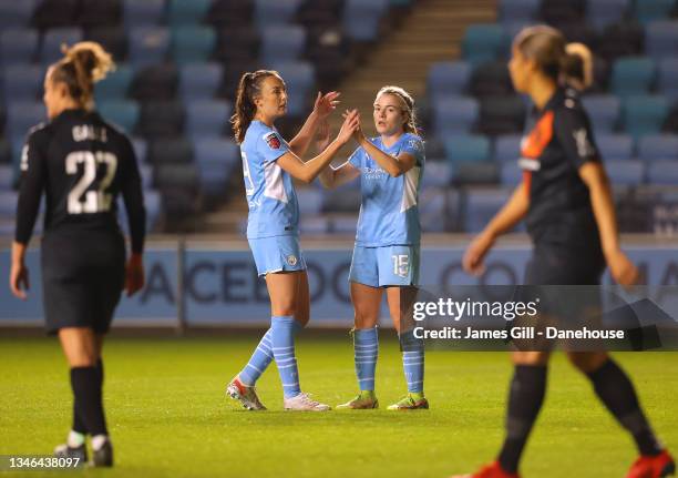 Lauren Hemp of Manchester City Women celebrates with Caroline Weir after scoring their third goal during the FA Women's Continental Tyres League Cup...