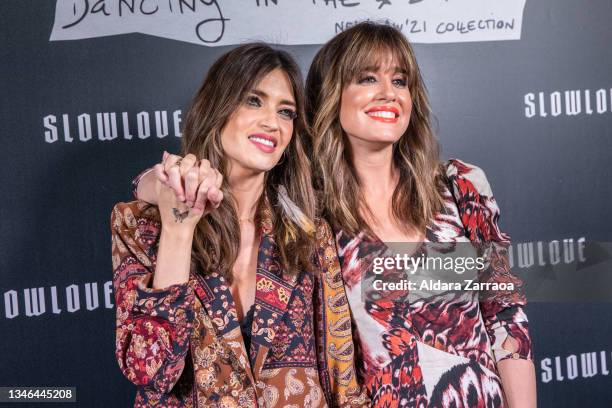 Spanish journalists Sara Carbonero and Isabel Jimenez pose at the presentation of their new collection 'Slow Love: Dancing In The Street' at Bardot...