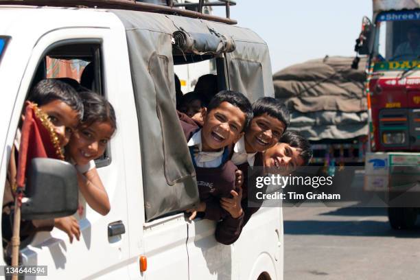 Schoolchildren on Delhi to Mumbai National Highway 8 at Jaipur, Rajasthan, Northern India