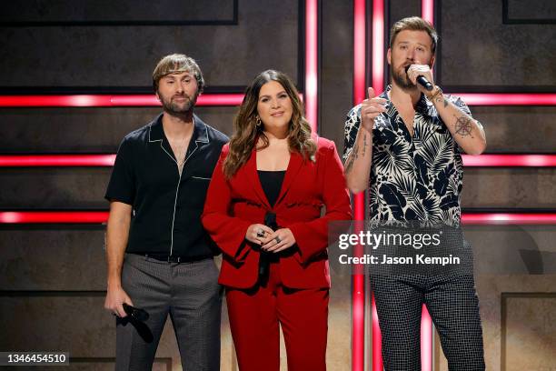 Dave Haywood, Hillary Scott and Charles Kelley of Lady A speak onstage during the 2021 CMT Artist of the Year on October 13, 2021 in Nashville,...