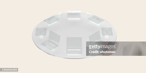 high angle view isometric design of vectorial transparent round table and open laptops - round table stockfoto's en -beelden