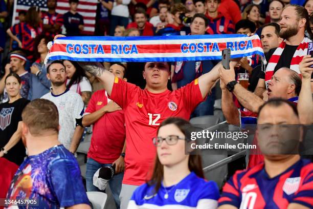 Costa Rica fan holds up a scarf during the national anthem before a 2022 World Cup Qualifying match against the United States at Lower.com Field on...