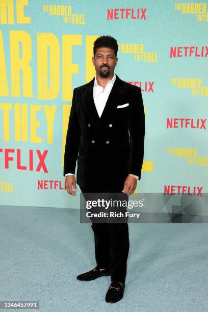 Deon Cole attends the Los Angeles premiere of "The Harder They Fall" at Shrine Auditorium and Expo Hall on October 13, 2021 in Los Angeles,...