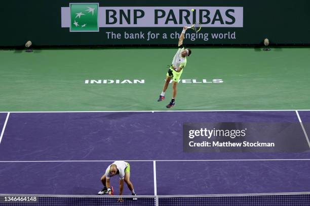 Michael Venus of New Zealand and Tim Puetz of Germany play Kevin Krawietz of Germany and Horia Tecau of Romania during the BNP Paribas Open at the...