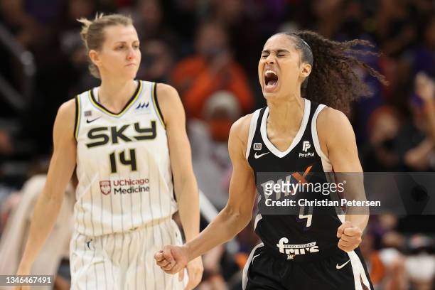 Skylar Diggins-Smith of the Phoenix Mercury celebrates after a turnover ahead of Allie Quigley of the Chicago Sky during the second half in Game Two...