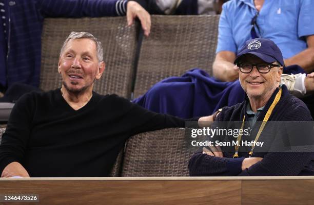 Larry Ellison and Bill Gates watch a match between Gael Monfils of France and Alexander Zverev of Germany on Day 10 of the BNP Paribas Open at the...