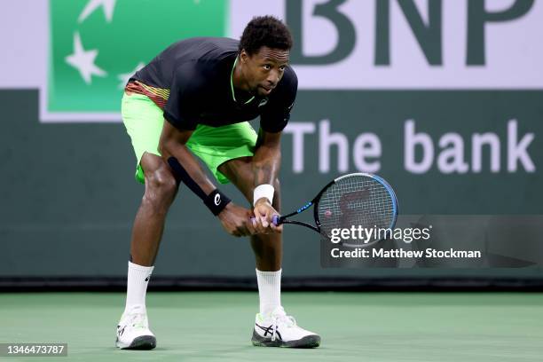 Gaels Monfils of France plays Alexander Zverev of Germany during the BNP Paribas Open at the Indian Wells Tennis Garden on October 13, 2021 in Indian...