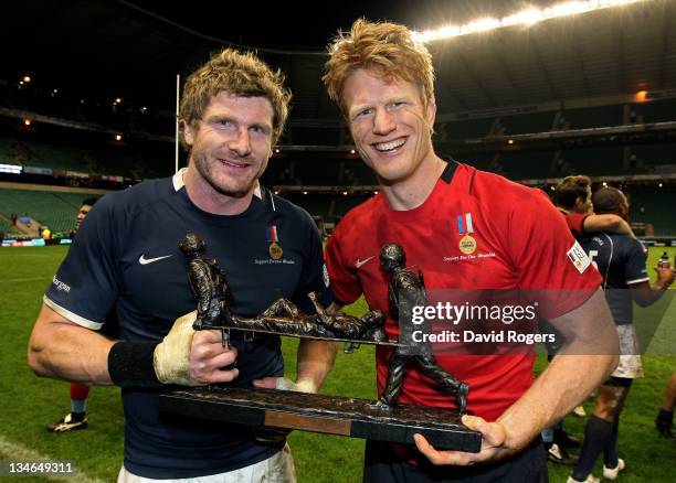 Opposing captains Adam Thomson of the Southern Hemisphere XV and Hugh Vyvyan of the H4H Northern Hemisphere XV pose with the trophy following the...