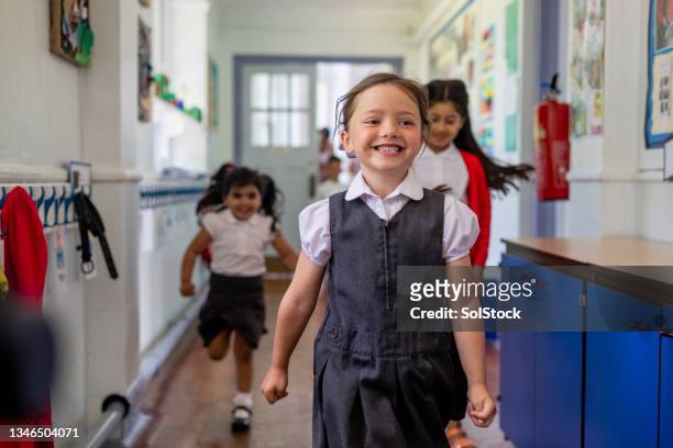 having fun at school - school uniform stock pictures, royalty-free photos & images