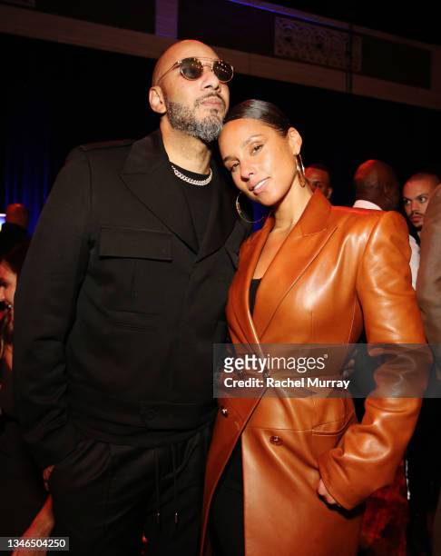 Swizz Beatz and Alicia Keys attend a special screening of “The Harder They Fall” at the Shrine Auditorium and Expo Hall on October 13, 2021 in Los...