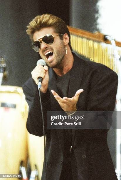 George Michael Instruments George Michael In Concert Photos and Premium High Res Pictures - Getty ...