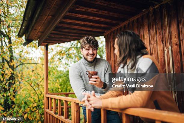 enjoy the cold autumn day - cabana de madeira imagens e fotografias de stock