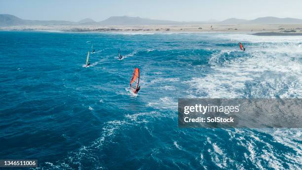 aerial view of wind surfing - wind surfing stock pictures, royalty-free photos & images