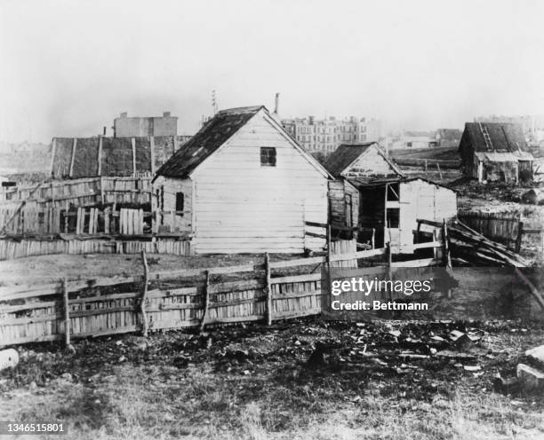 Wood-built property at 98th Street and Fifth Avenue in East Harlem, Upper Manhattan, New York City, New York, 1888. The properties in the area, built...