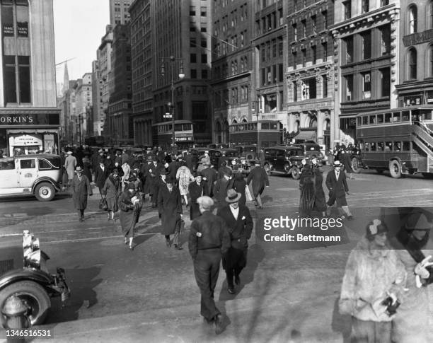 Shopping crowds at Fifth Avenue and 42nd Street during the bank holiday in the borough of Manhattan in New York City, New York, 10th March 1933. On...