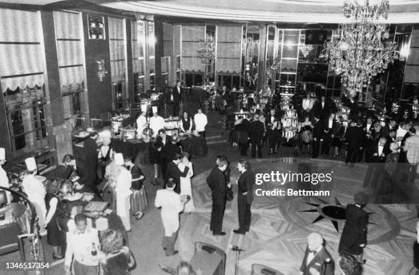 Chefs cook, dancers dance and diners dine during an unspecified event held in the newly refurbished Rainbow Room, on the 65th floor of 30 Rockefeller...