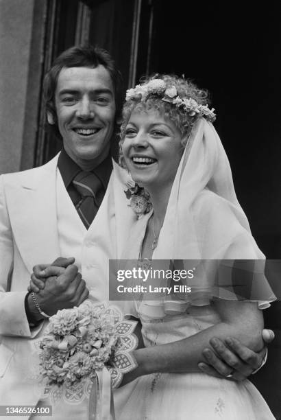 English actor Robert Lindsay marries actress Cheryl Hall at St Andrew's Church on Ham Common, Richmond, London, UK, 21st September 1974.