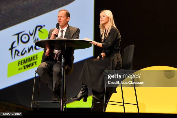 Christian Prudhomme of France Director of Le Tour de France and Marion Rousse of France Director of the women's Tour de France speak during the 109th...