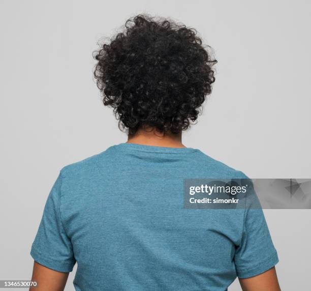 rear view of young man - black hair back stock pictures, royalty-free photos & images