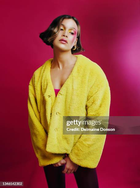 shot of a young woman posing against a pink background - fashion model stock pictures, royalty-free photos & images