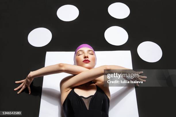 woman in swimsuit in creative studio on black and white background - woman perfect body imagens e fotografias de stock