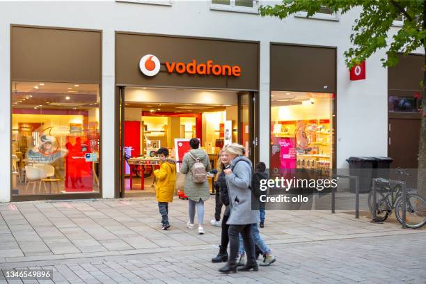 vodafone store in wiesbaden, germany - vodafone stock pictures, royalty-free photos & images