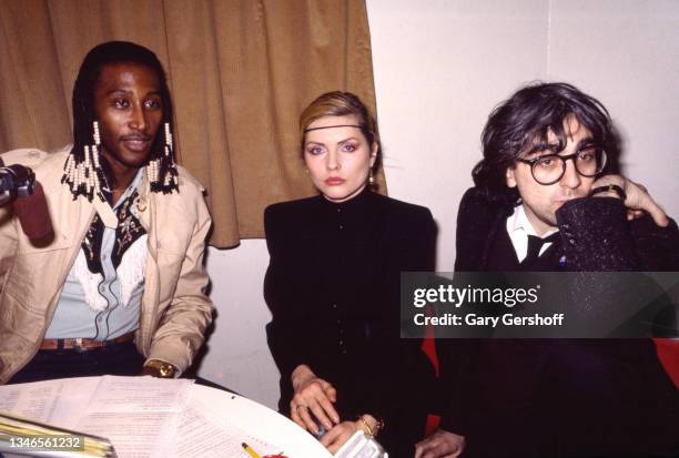 View of, from left, WBLS-FM radio Program Director and on-air DJ Frankie Crocker and New Wave musicians Debbie Harry & Chris Stein, both of the group...