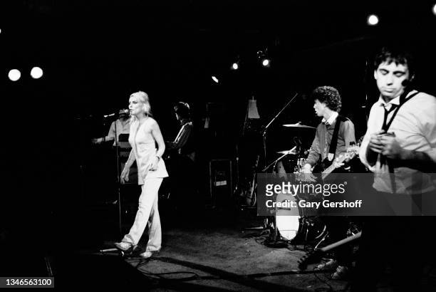 View of members of American New Wave group Blondie as they perform onstage at My Father's Place, Roslyn, New York, June 1, 1978. Pictured are, from...