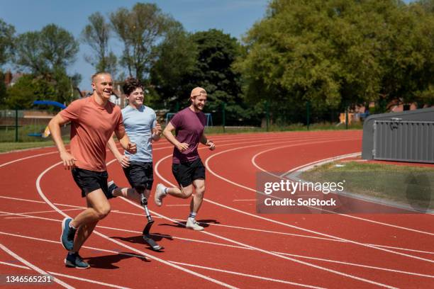 feeling good while running - amputee running stock pictures, royalty-free photos & images