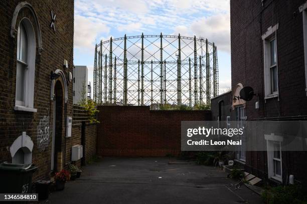 The framework of an unused gasometer is seen near a residential street next to the Oval cricket ground on October 14, 2021 in London, United Kingdom....