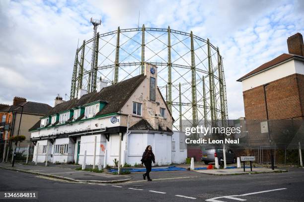 The framework of an unused gasometer is seen near a residential street next to the Oval cricket ground on October 14, 2021 in London, United Kingdom....