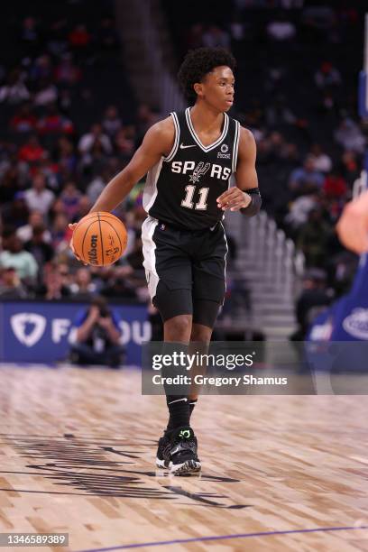 Joshua Primo of the San Antonio Spurs plays against the Detroit Pistons at Little Caesars Arena on October 06, 2021 in Detroit, Michigan. NOTE TO...
