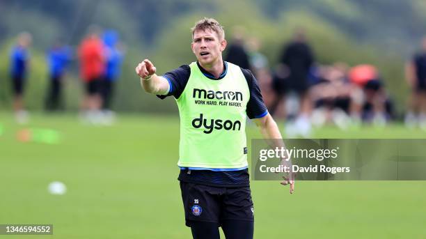 Ruaridh McConnochie issues instructions during the Bath training session held on October 13, 2021 in Bath, England.