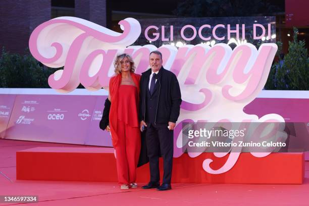 Myrta Merlino and Marco Tardelli attend the red carpet of the movie "The Eyes Of Tammy Faye" during the 16th Rome Film Fest 2021 on October 14, 2021...