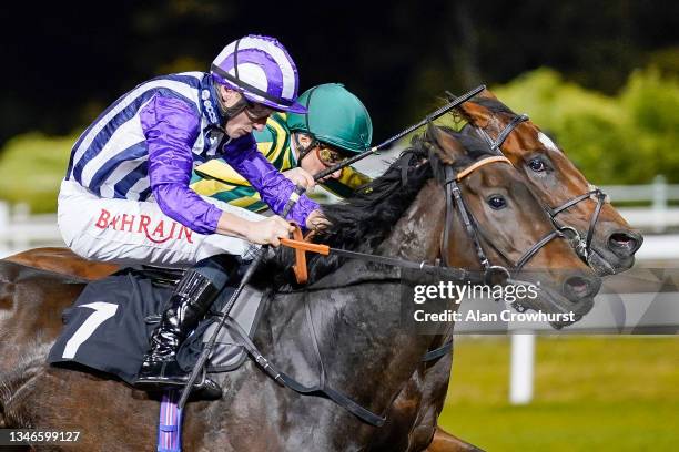Tom Marquand riding Under The Twilight win The Support The Injured Jockeys Fund Novice Stakes at Chelmsford City Racecourse on October 14, 2021 in...