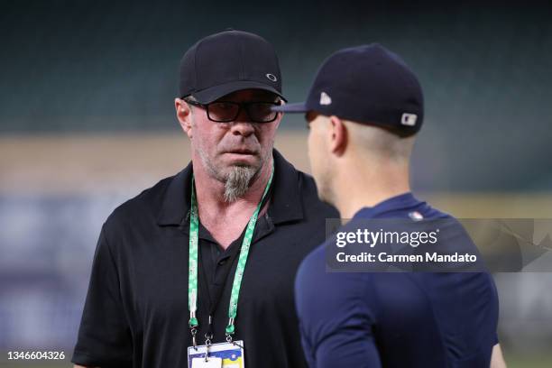 Jeff Bagwell speaks with Alex Bregman participates in a workout prior to the start of the American League Championship Series against the Boston Red...