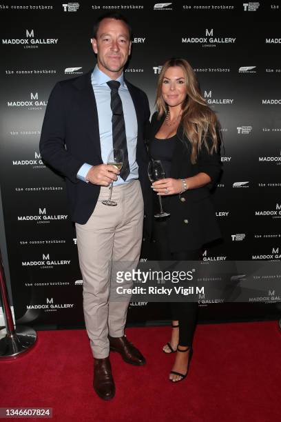 John Terry and Toni Terry attend the opening of an exhibition by The Connor Brothers at Maddox Gallery on October 14, 2021 in London, England.