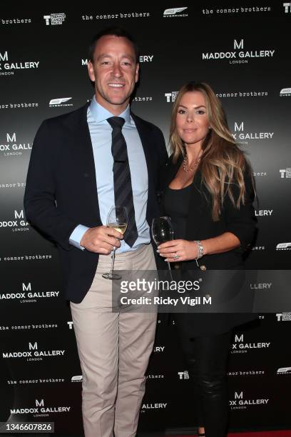 John Terry and Toni Terry attend the opening of an exhibition by The Connor Brothers at Maddox Gallery on October 14, 2021 in London, England.