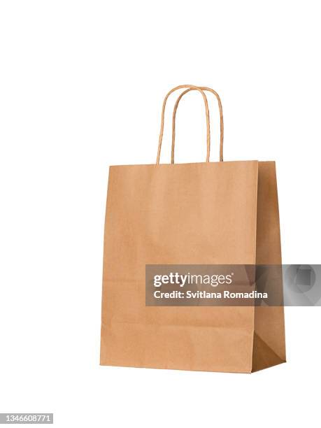 craft shopping bag isolatedon white. recycled paper, zero waste. - busta di carta foto e immagini stock