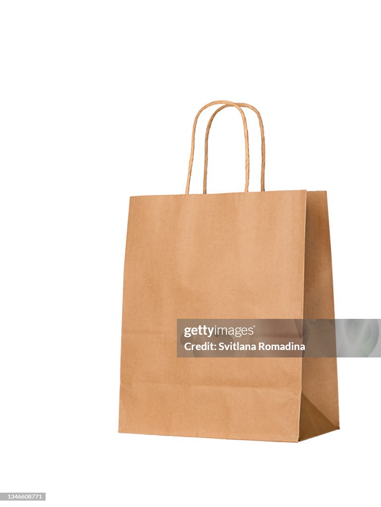 Craft shopping bag isolatedon white. Recycled paper, zero waste.