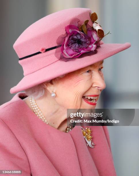 Queen Elizabeth II attends the opening ceremony of the sixth session of the Senedd at The Senedd on October 14, 2021 in Cardiff, Wales.