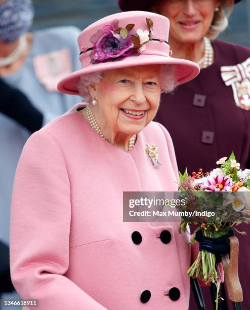 Queen Elizabeth II attends the opening ceremony of the sixth session of the Senedd at The Senedd on October 14, 2021 in Cardiff, Wales.