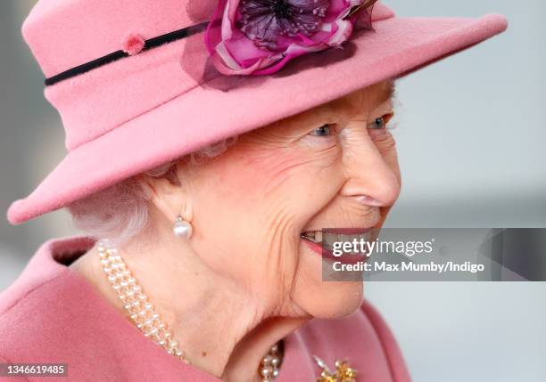 Queen Elizabeth II attends the opening ceremony of the sixth session of the Senedd at The Senedd on October 14, 2021 in Cardiff, Wales.