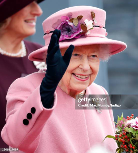 Queen Elizabeth II attends the opening ceremony of the sixth session of the Senedd at The Senedd on October 14, 2021 in Cardiff, Wales.