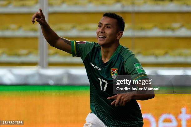 Roberto Fernandez of Bolivia celebrates after scoring the fourth goal of his team during a match between Bolivia and Paraguay as part of South...