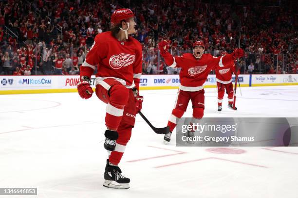 Tyler Bertuzzi of the Detroit Red Wings celebrates his second period goal with Lucas Raymond while playing the Tampa Bay Lightning at Little Caesars...