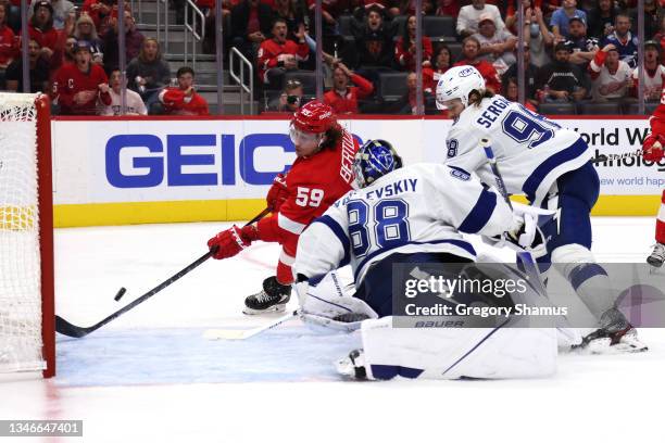 Tyler Bertuzzi of the Detroit Red Wings scores a second period gaol past Andrei Vasilevskiy of the Tampa Bay Lightning at Little Caesars Arena on...